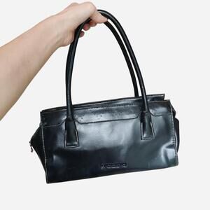 Black XOXO faux leather handbag with a boho vibe